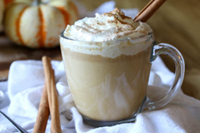 A pumpkin spice Choffy latte topped with whipped cream