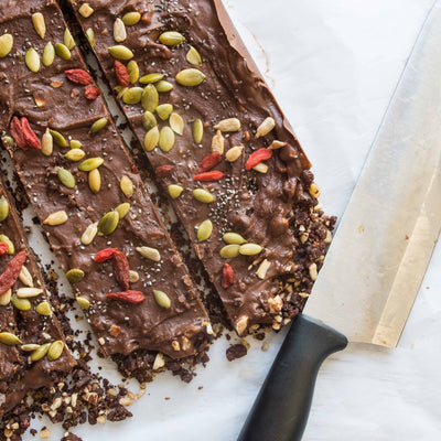 No-bake superfood chocolate Choffy seed and nut bars cut into squares
